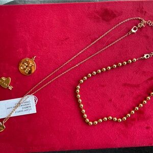 Urban Outfitters LOVE-ly Gold-Tone Bead and Layered Necklace Set, three charms
